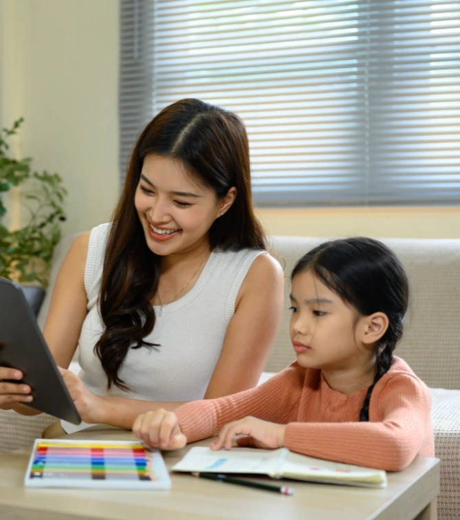 Child attending online therapy and educational session on a tablet