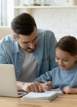 Father and child engaged in early learning activity
